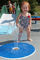 Spruzzi la zona di impatto dell'onda al suolo dei bambini dei getti della piattaforma della piscina di zona Toy Fountain